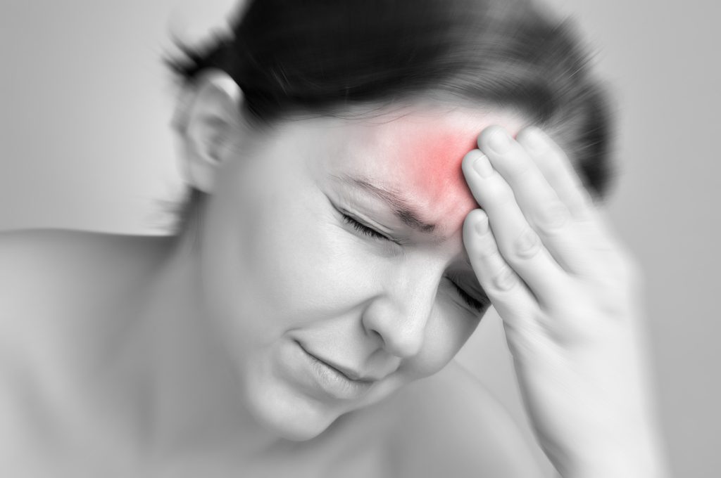 Woman suffering from migraine pain in Pinellas Park.